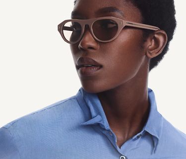 Prada Spring Summer 2025-The essential aesthetic meets the refined touch of details in the new Prada sunglasses. First at Sunglass Hut.