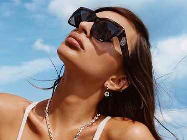 Tory Burch Spring 2026-Miller oversized square sunglasses, with transparent temples and Double T logo.